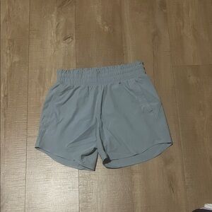 Under Armour Women's Athletic Shorts in Light Gray